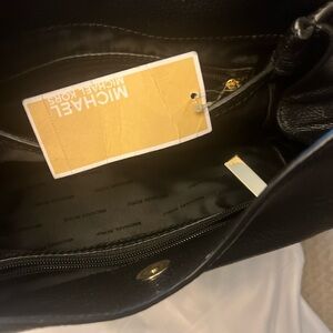 Black large micheal kors leather tote.